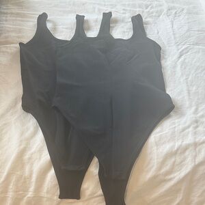 Chic Black Ribbed Bodysuit